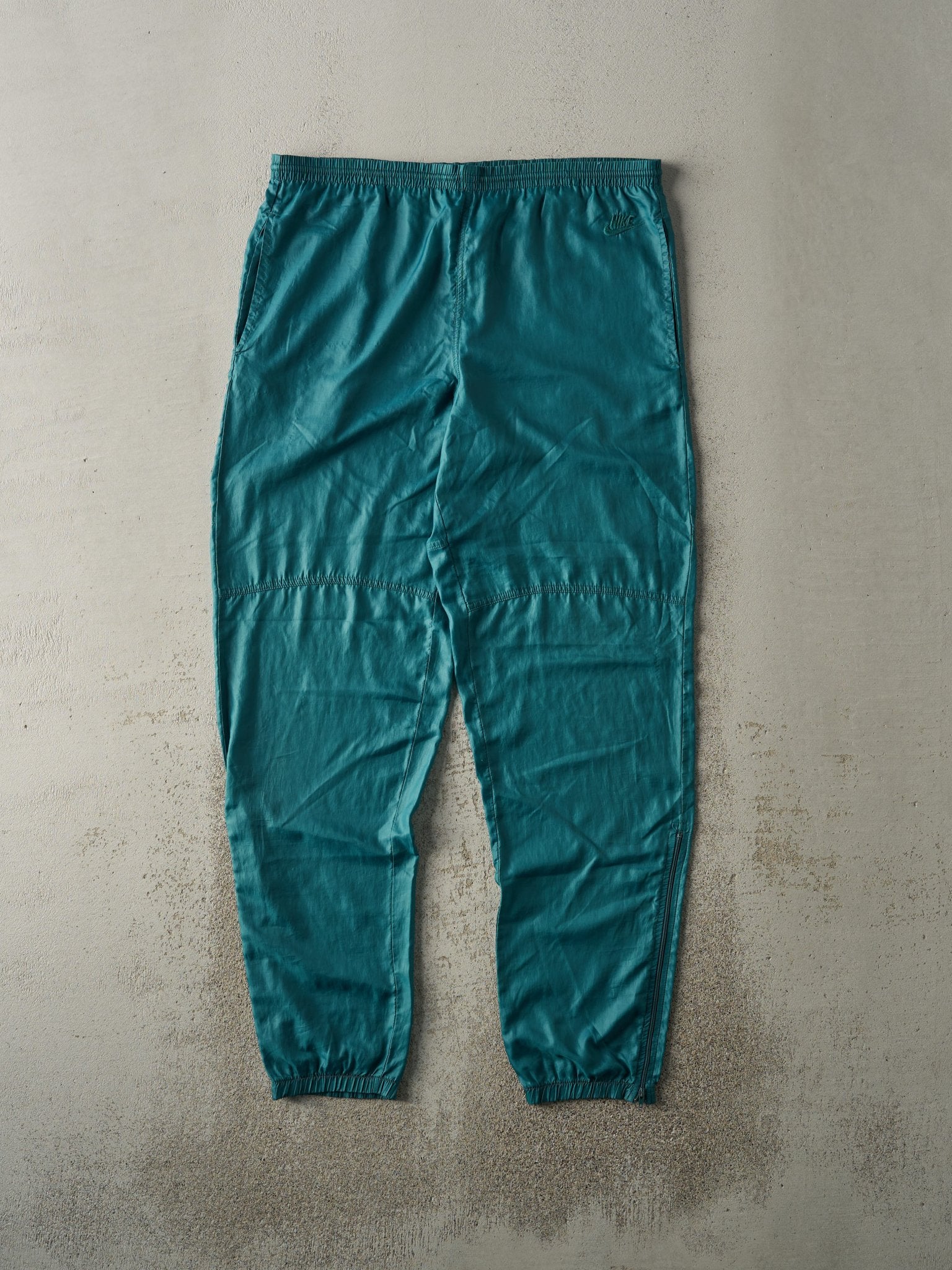 green nike windbreaker pants