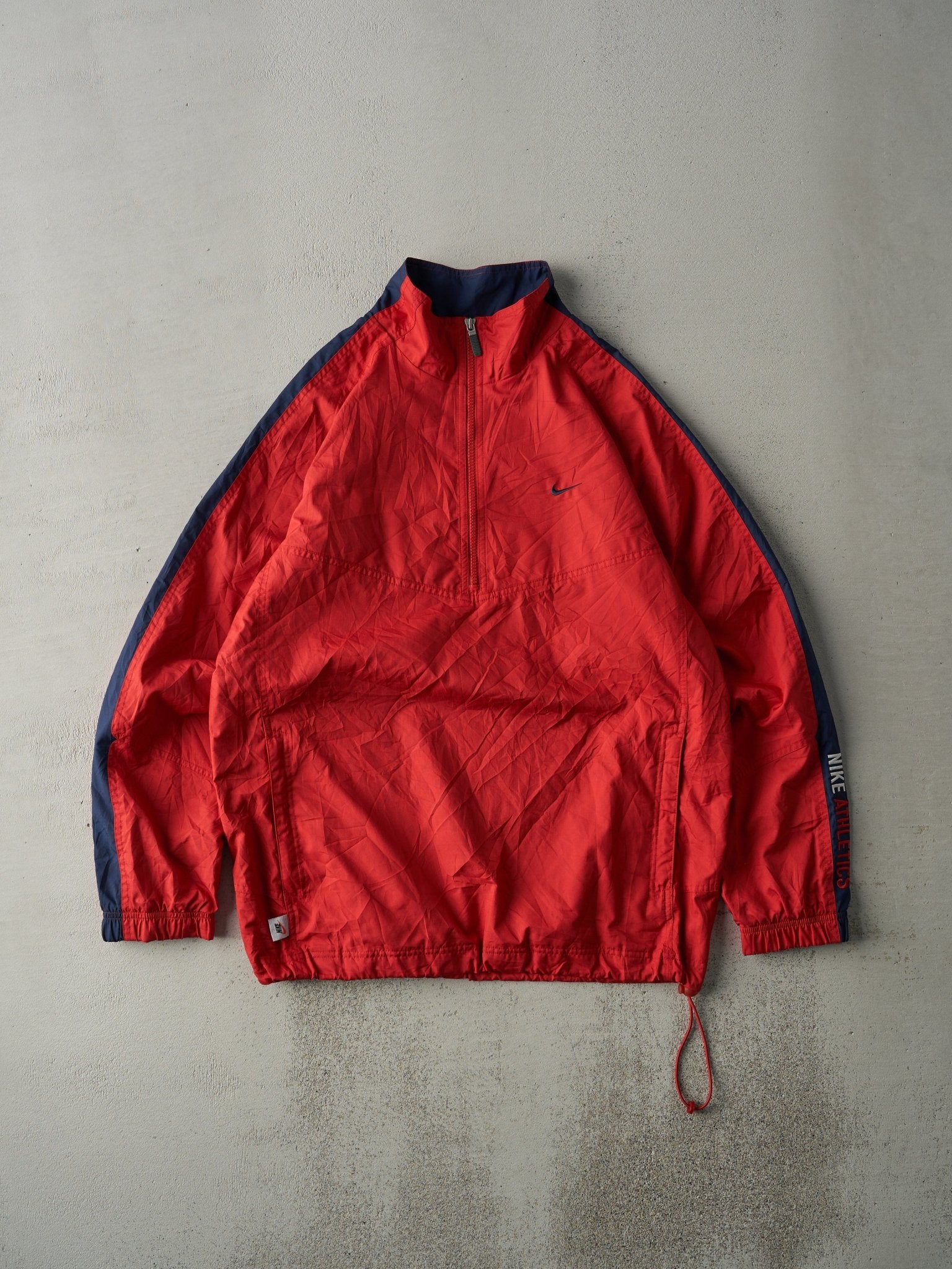 red and navy nike windbreaker