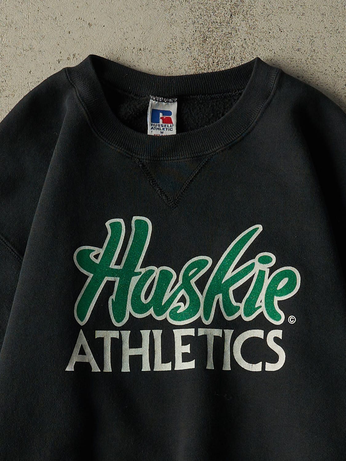 Vintage 90s Faded Black Russell Athletic Huskie Athletics Crewneck (S/M)