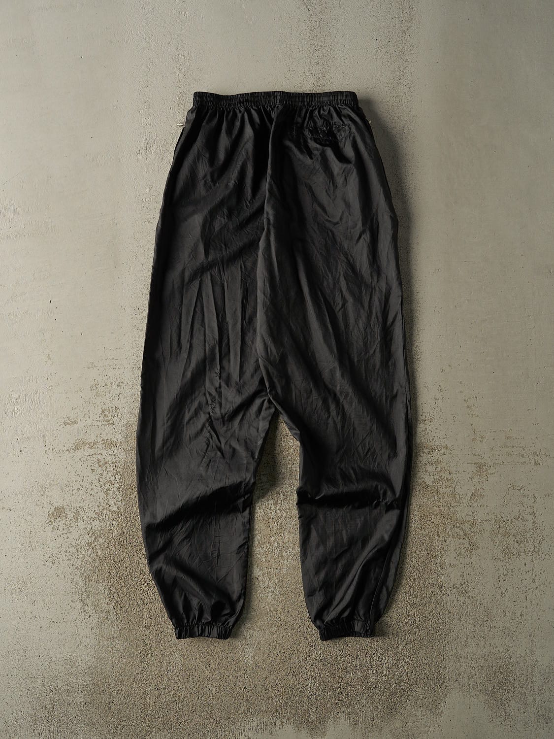 Vintage 90s Black Nike Embroidered Track Pants (28x32.5)