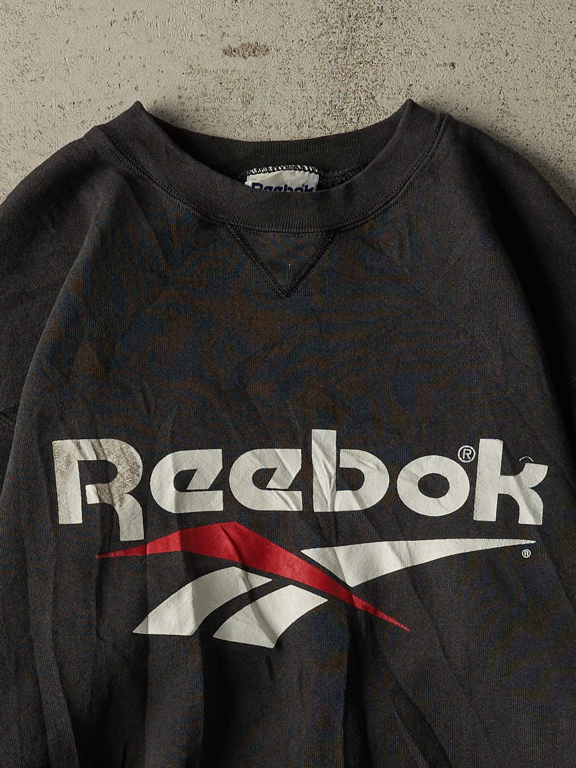 Vintage 90s Faded Black Reebok Crewneck (S/M)