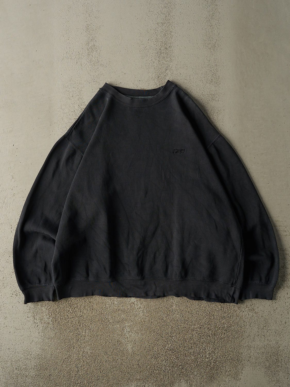 Vintage 90s Faded Black Reebok Embroidered Crewneck (XXL/XXXL)