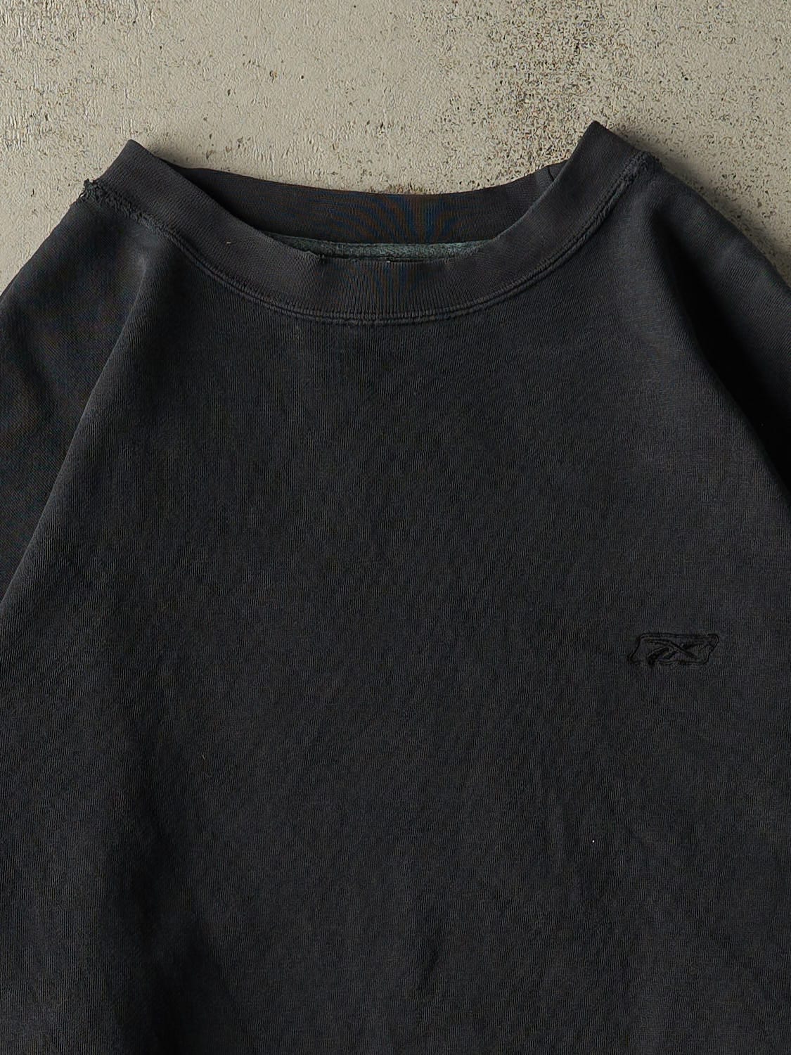 Vintage 90s Faded Black Reebok Embroidered Crewneck (XXL/XXXL)