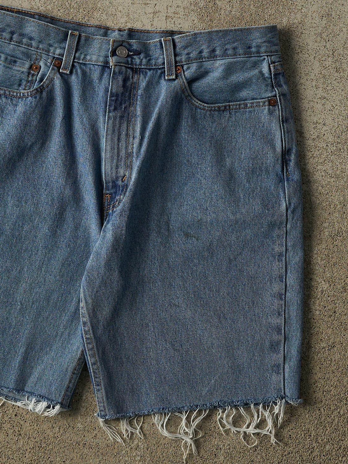 Vintage 90s Mid Wash Levi's 550 Cut Off Jean Shorts (36x10)