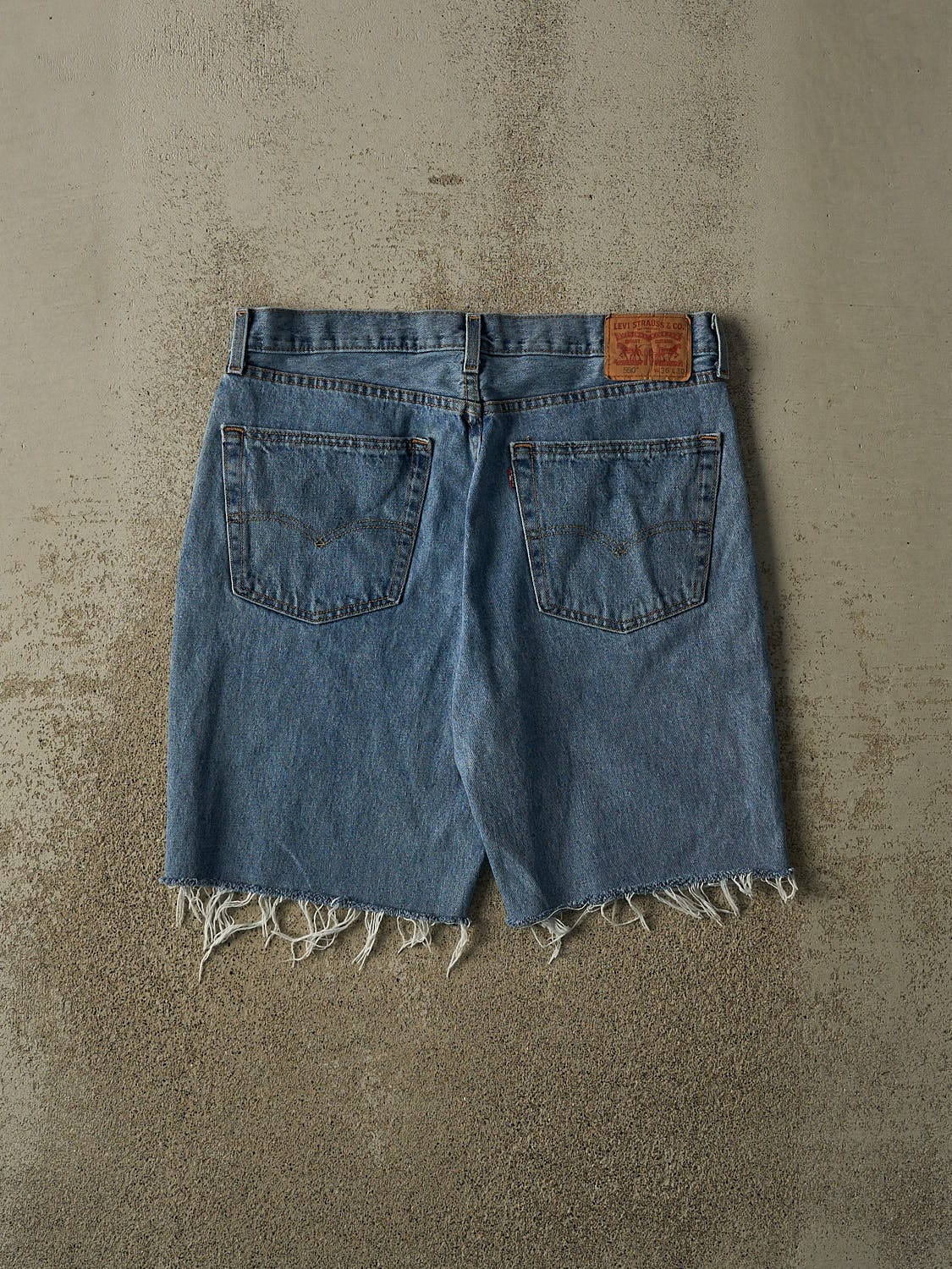 Vintage 90s Mid Wash Levi's 550 Cut Off Jean Shorts (36x10)