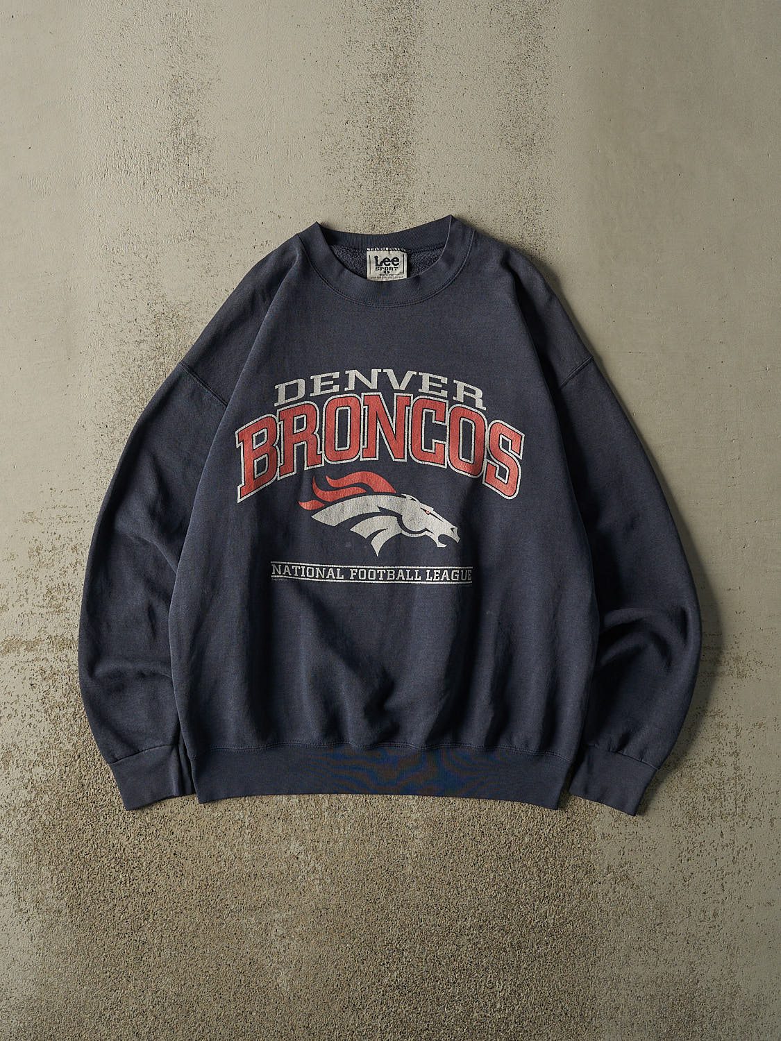 Vintage 90s Sun Faded Navy Denver Broncos Crewneck (L/XL)