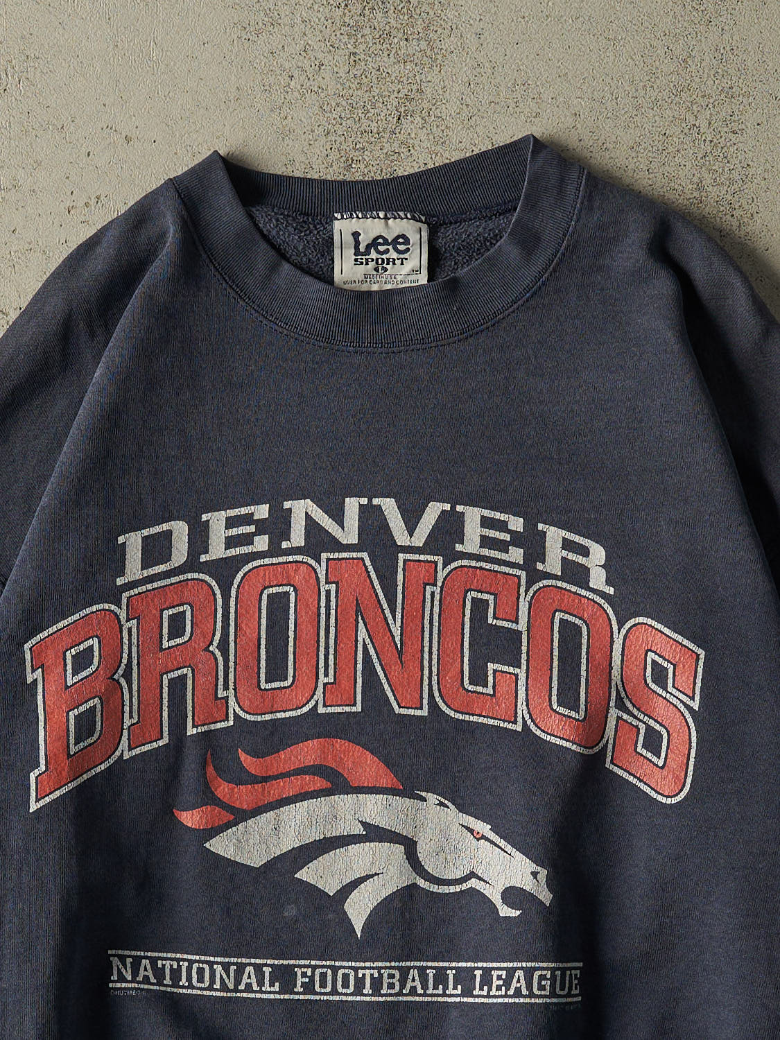 Vintage 90s Sun Faded Navy Denver Broncos Crewneck (L/XL)