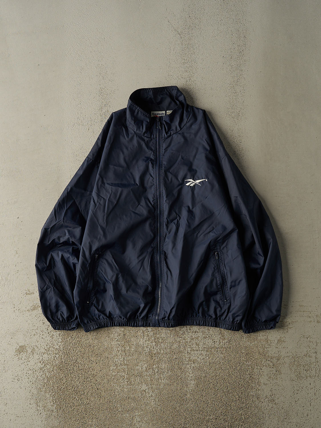 Vintage 90s Navy Blue Reebok Zip Up Windbreaker Jacket (L/XL)