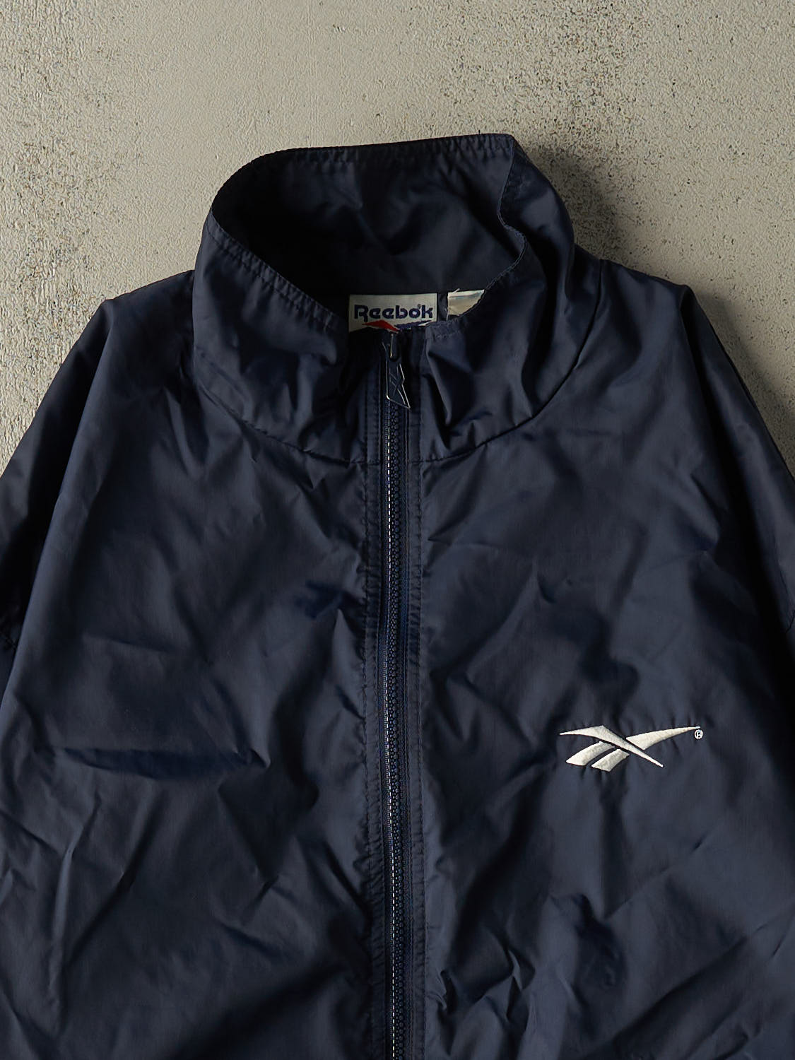 Vintage 90s Navy Blue Reebok Zip Up Windbreaker Jacket (L/XL)