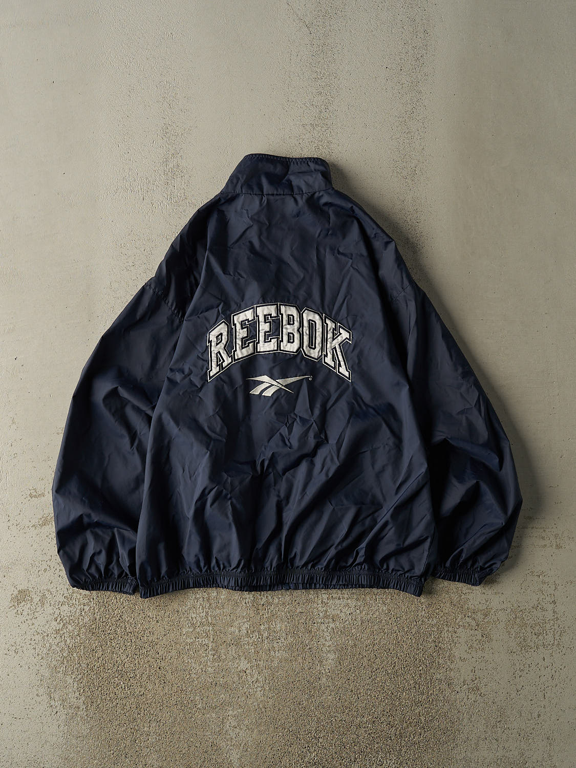 Vintage 90s Navy Blue Reebok Zip Up Windbreaker Jacket (L/XL)