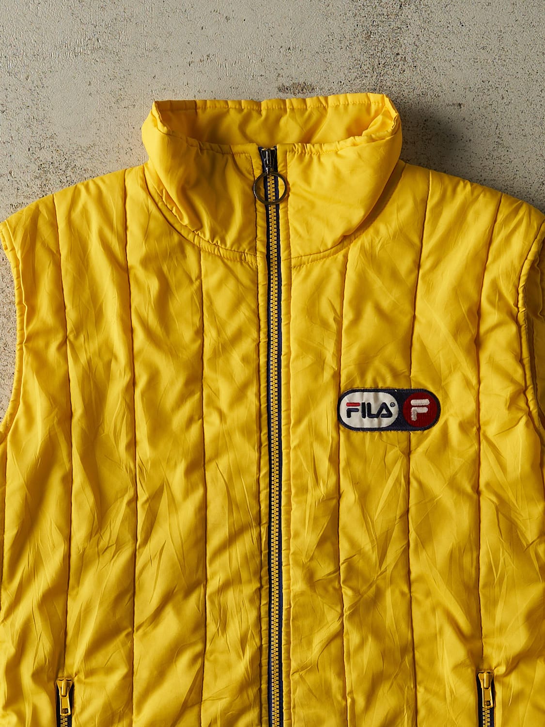 Vintage 90s Yellow Fila Puffer Vest (L/XL)