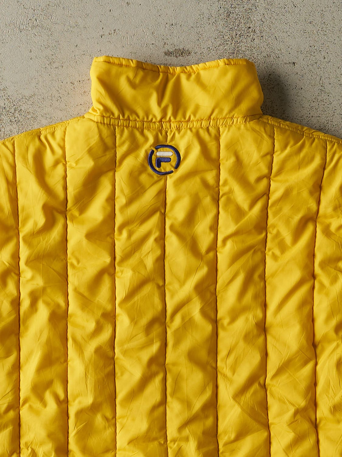 Vintage 90s Yellow Fila Puffer Vest (L/XL)