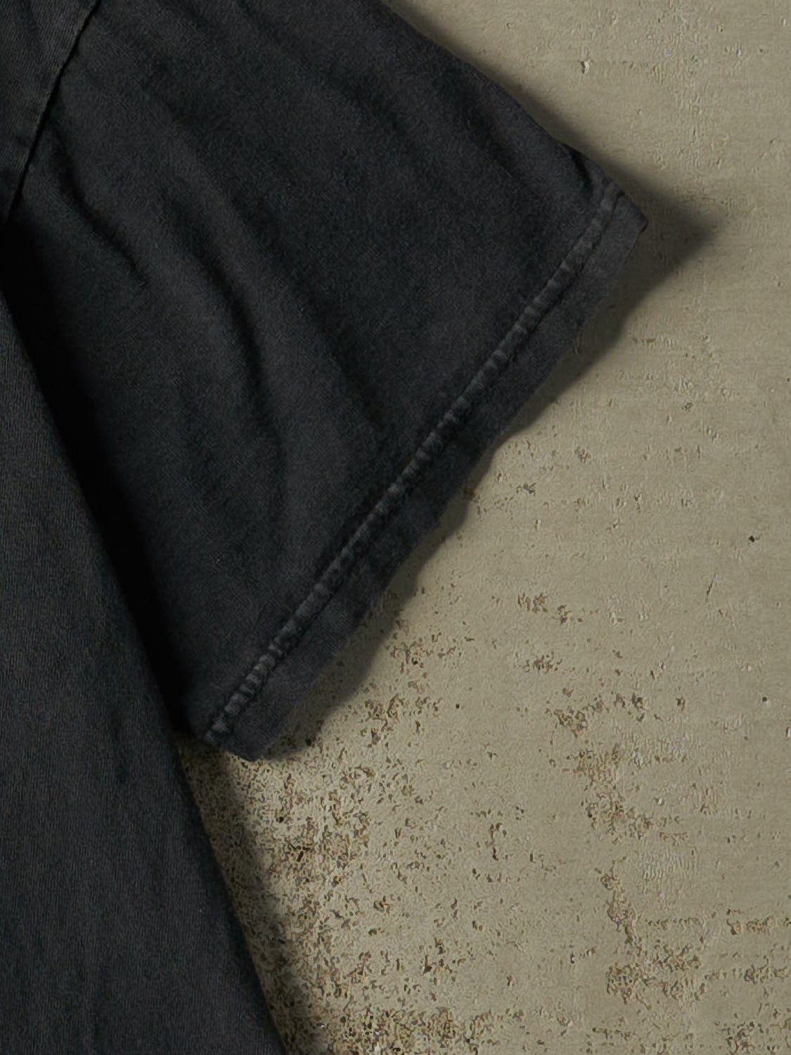 Vintage 90s Faded Black Nike Embroidered V-Neck Tee (M/L)