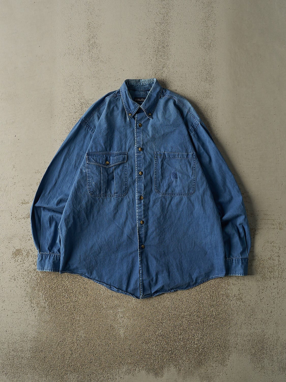 Vintage Y2K Dark Wash Nautica Embroidered Denim Button Up Tee (L/XL)