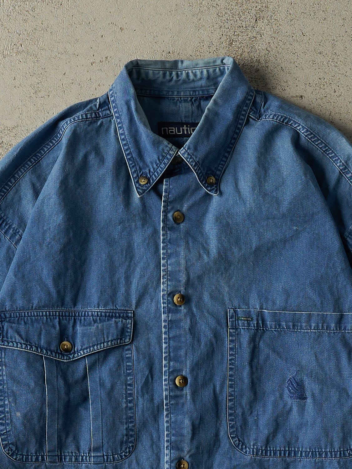 Vintage Y2K Dark Wash Nautica Embroidered Denim Button Up Tee (L/XL)