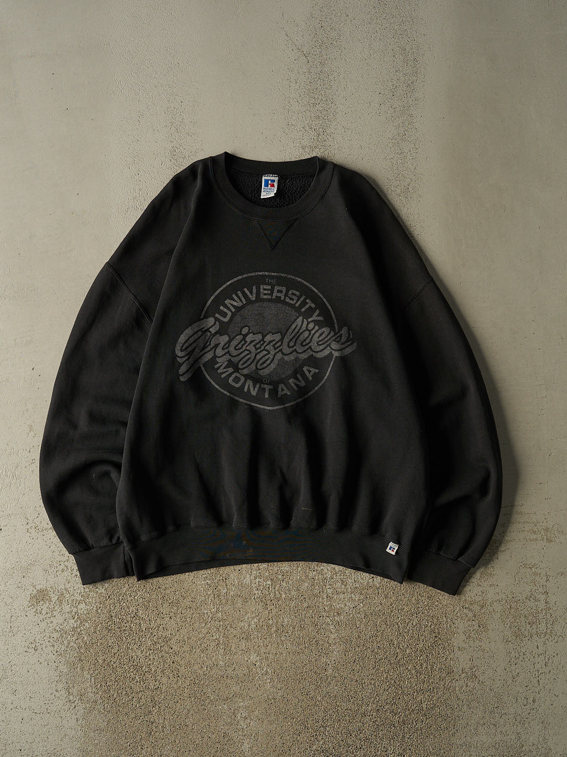 Vintage 90s Faded Black Russell Athletic University of Montana Grizzlies Crewneck (XXXL)