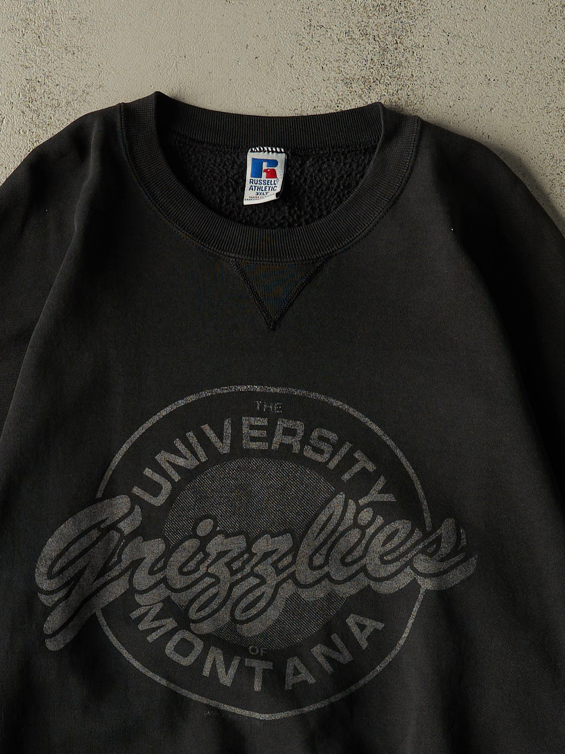Vintage 90s Faded Black Russell Athletic University of Montana Grizzlies Crewneck (XXXL)