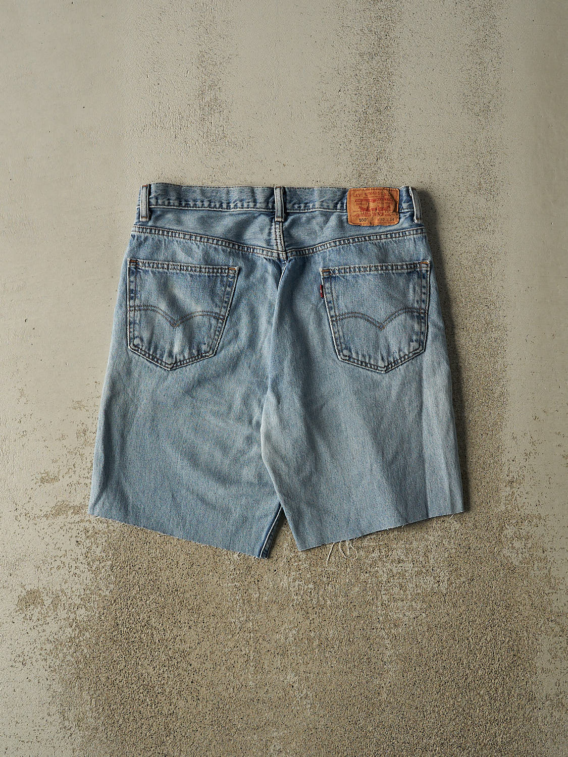 Vintage Y2K Light Wash Levi's 550 Cut Off Jean Shorts (35x9.5)