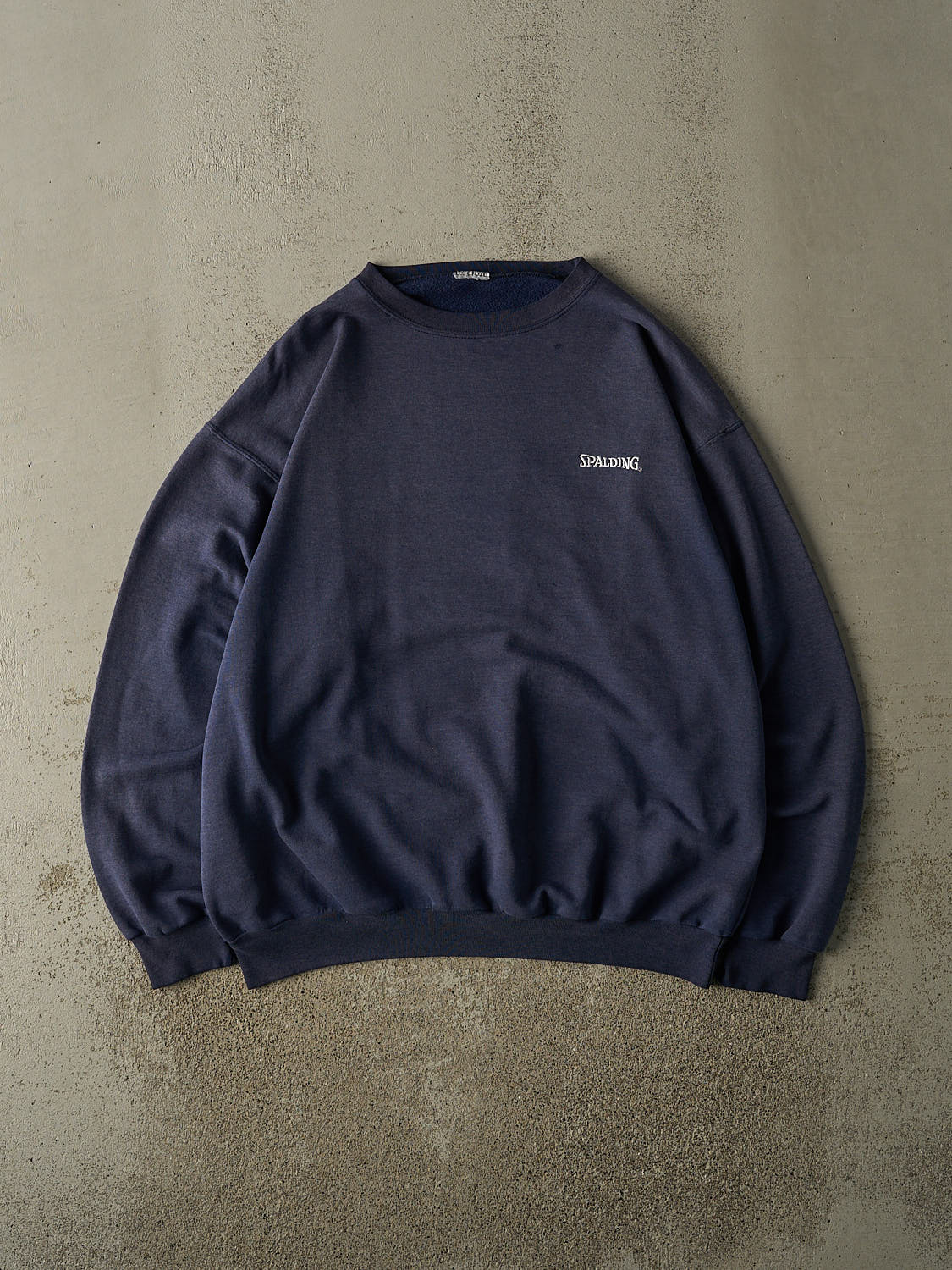 Vintage 90s Sun Faded Navy Spalding Embroidered Logo Crewneck (XL/XXL)