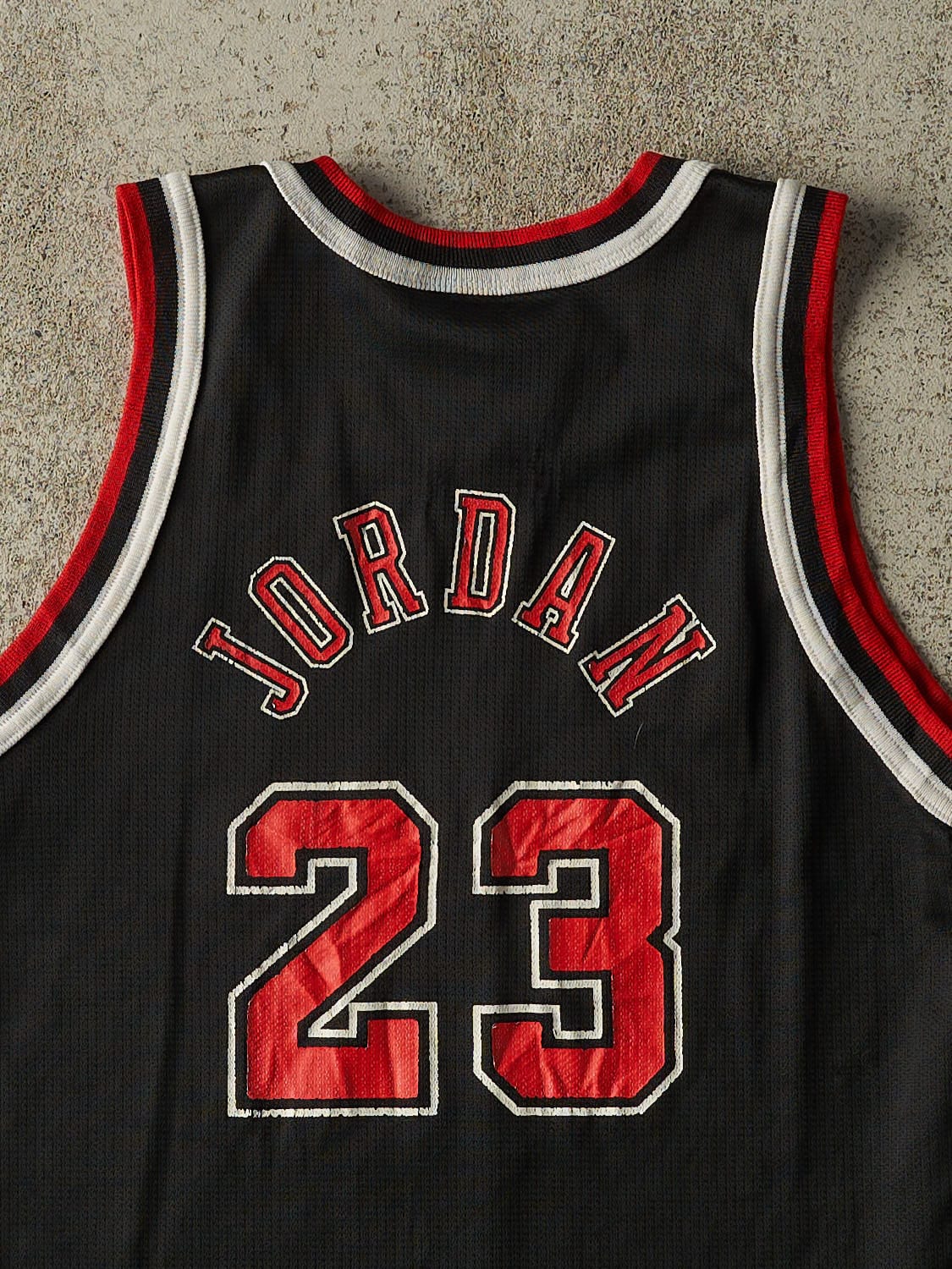 Vintage 90s Black Champion Chicago Bulls Michael Jordan Jersey (XXXS/XXS)