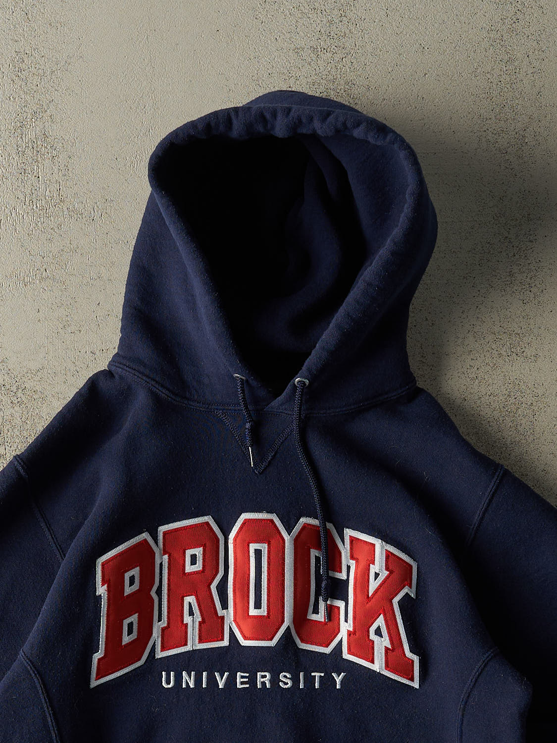 Vintage Y2K Navy Blue Russell Athletic Brock University Embroidered Hoodie (S/M)