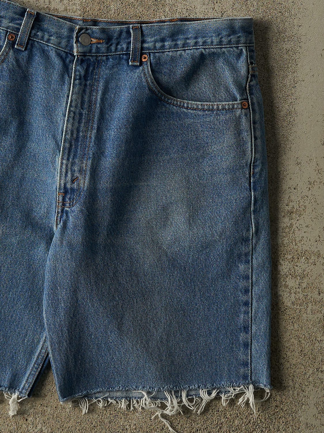 Vintage 90s Mid Wash Levi's 550 Cut Off Jean Shorts (36x9.5)