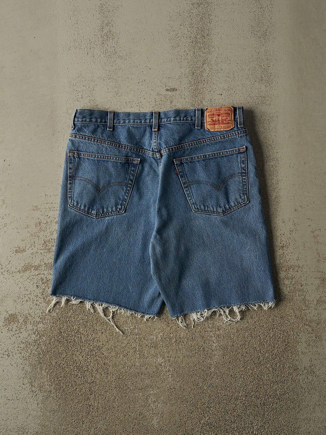Vintage 90s Mid Wash Levi's 550 Cut Off Jean Shorts (36x9.5)