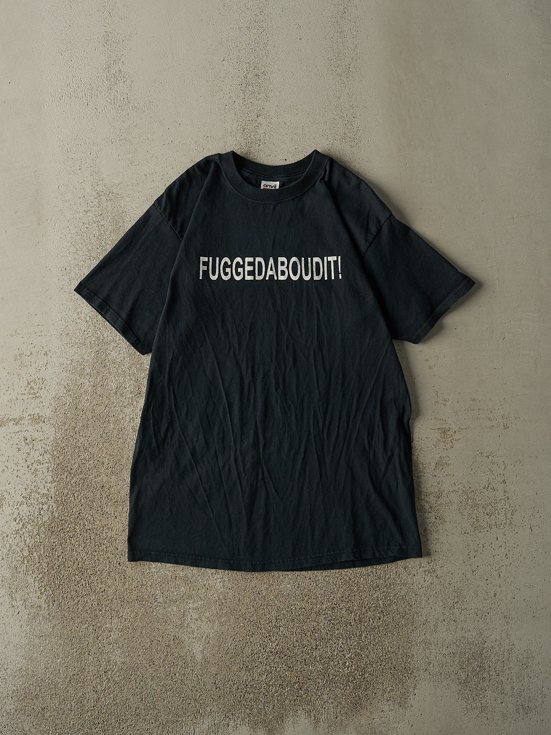 Vintage Y2K Black "Fuggedaboudit!" Slogan Tee (M)