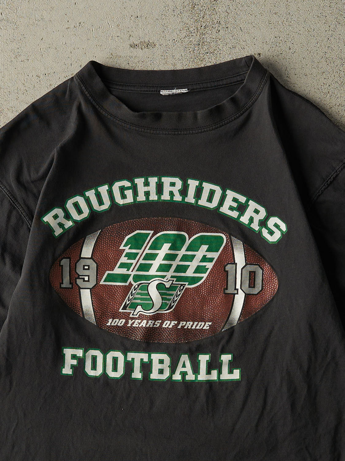 Vintage 10' Faded Black Saskatchewan Roughriders Tee (XS/S)