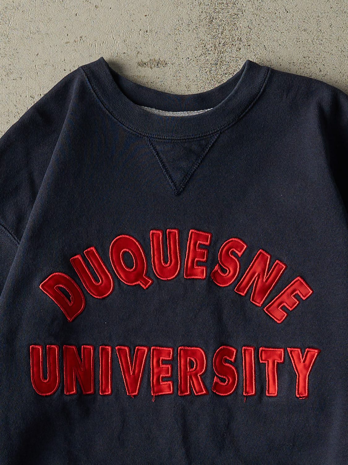Vintage 90s Navy Blue Champion Duquesne University Embroidered Crewneck (XS/S)