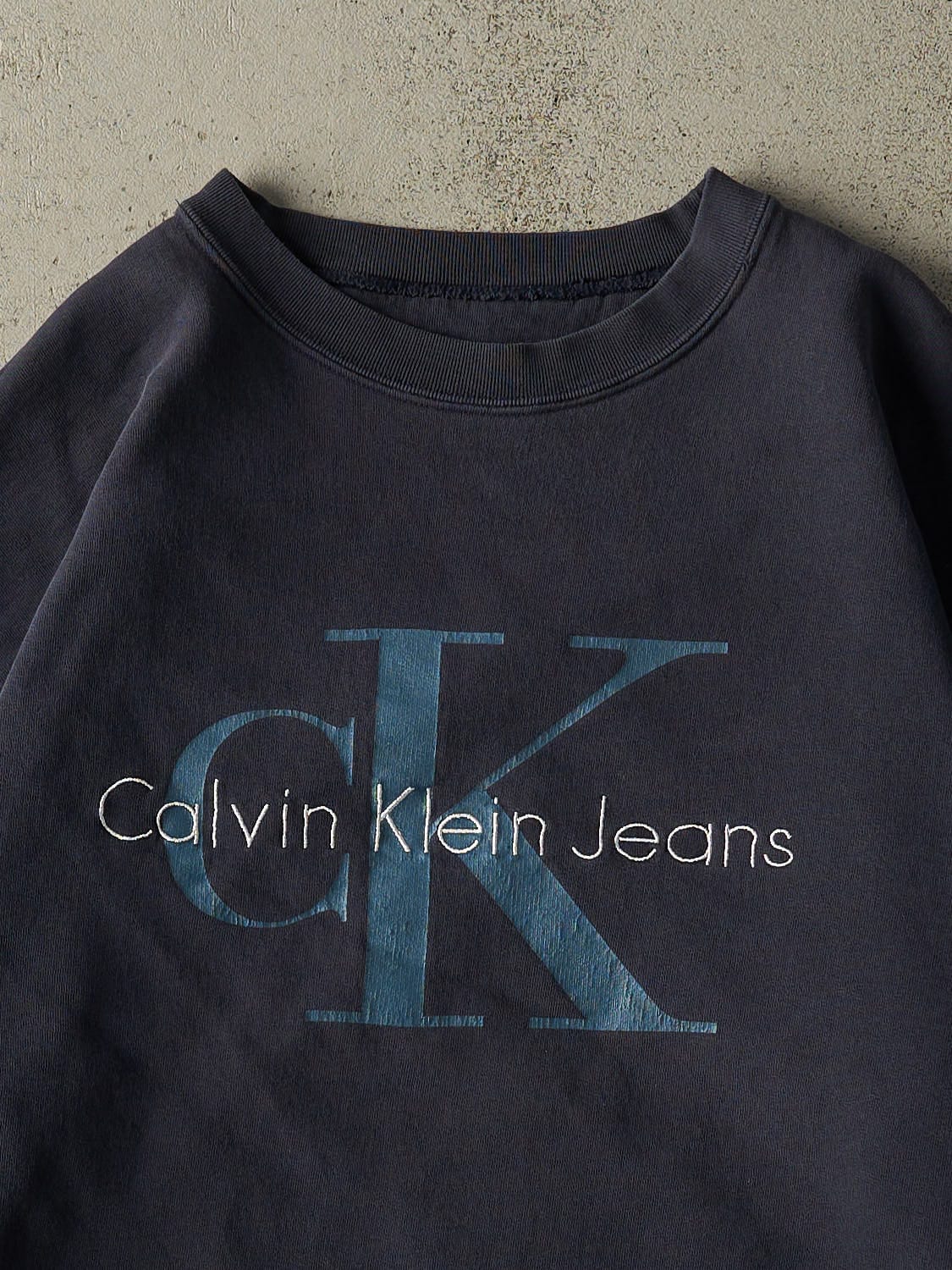 Vintage 90s Sun Faded Navy Calvin Klein Jean Embroidered Crewneck (M/L)