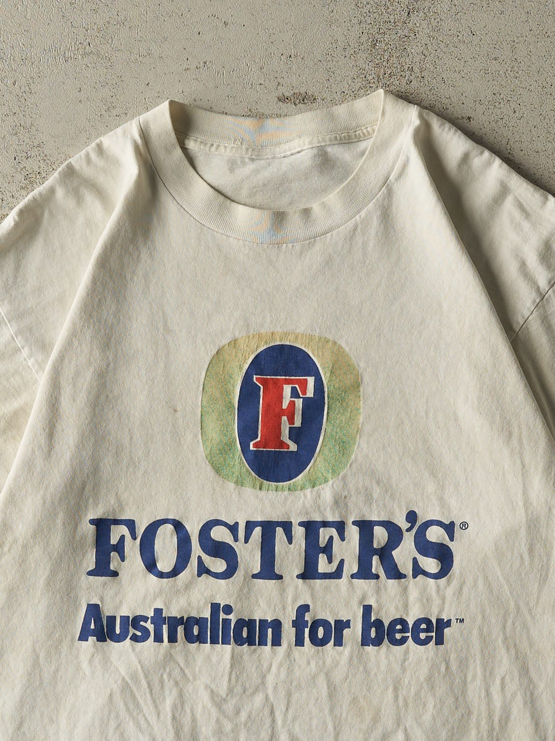 Vintage 90s Beige Foster's Beer Tee (L)