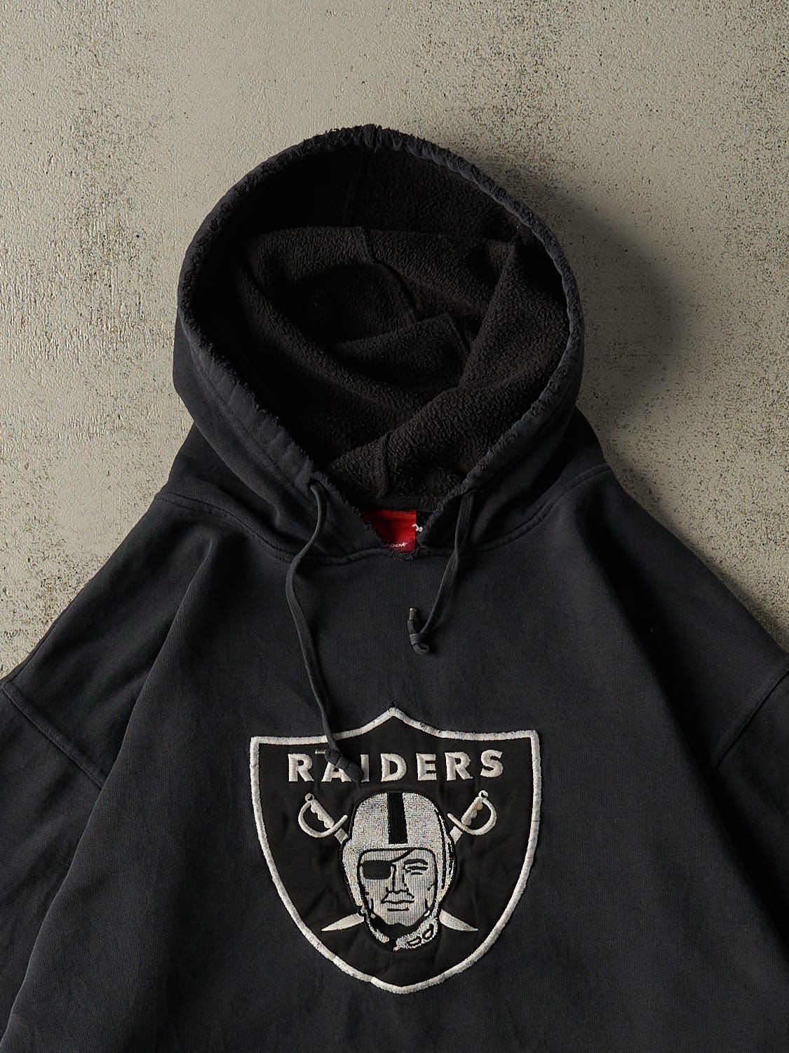 Vintage Y2K Faded Black Oakland Raiders Embroidered Hoodie (XL/XXL)
