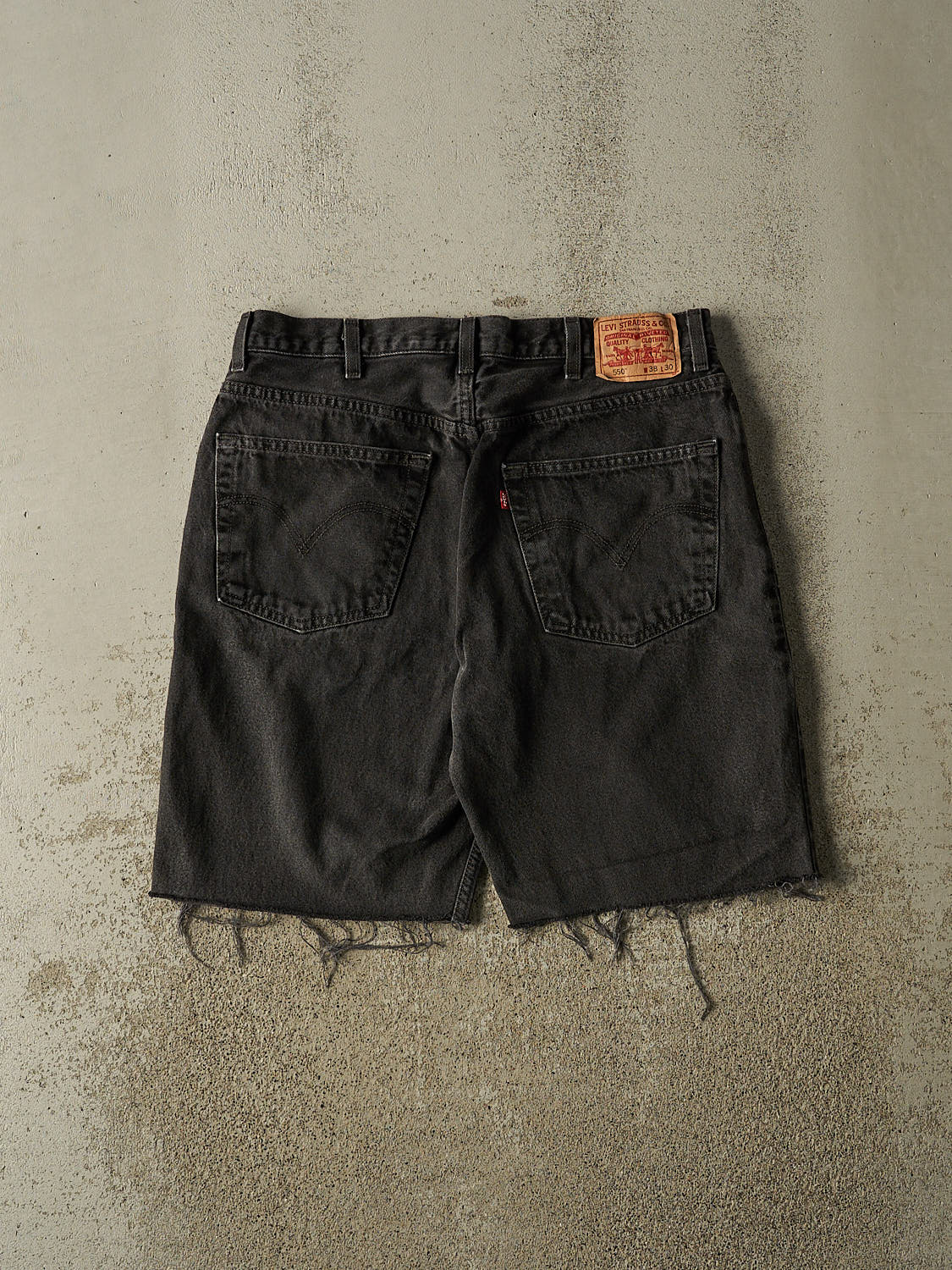 Vintage 90s Black Levi's 550 Cut Off Denim Shorts (35x9.5)