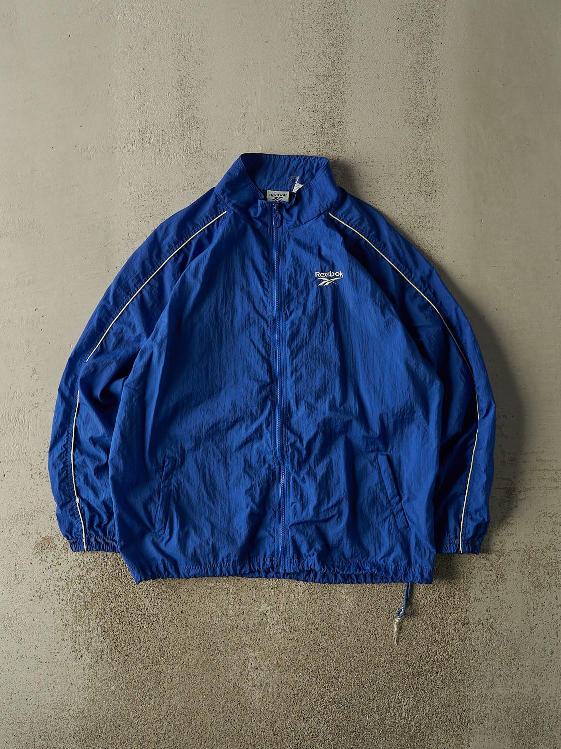 Vintage 90s Blue Reebok Embroidered Windbreaker Jacket (XL/XXL)