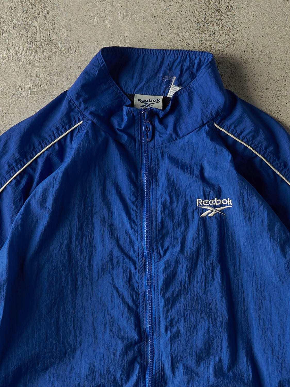 Vintage 90s Blue Reebok Embroidered Windbreaker Jacket (XL/XXL)