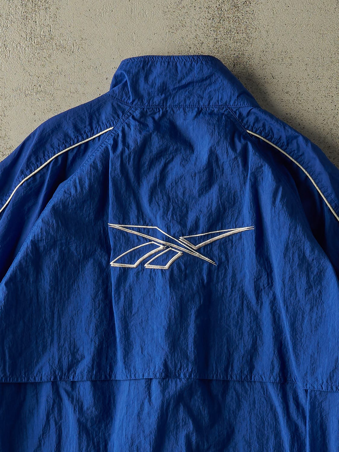 Vintage 90s Blue Reebok Embroidered Windbreaker Jacket (XL/XXL)