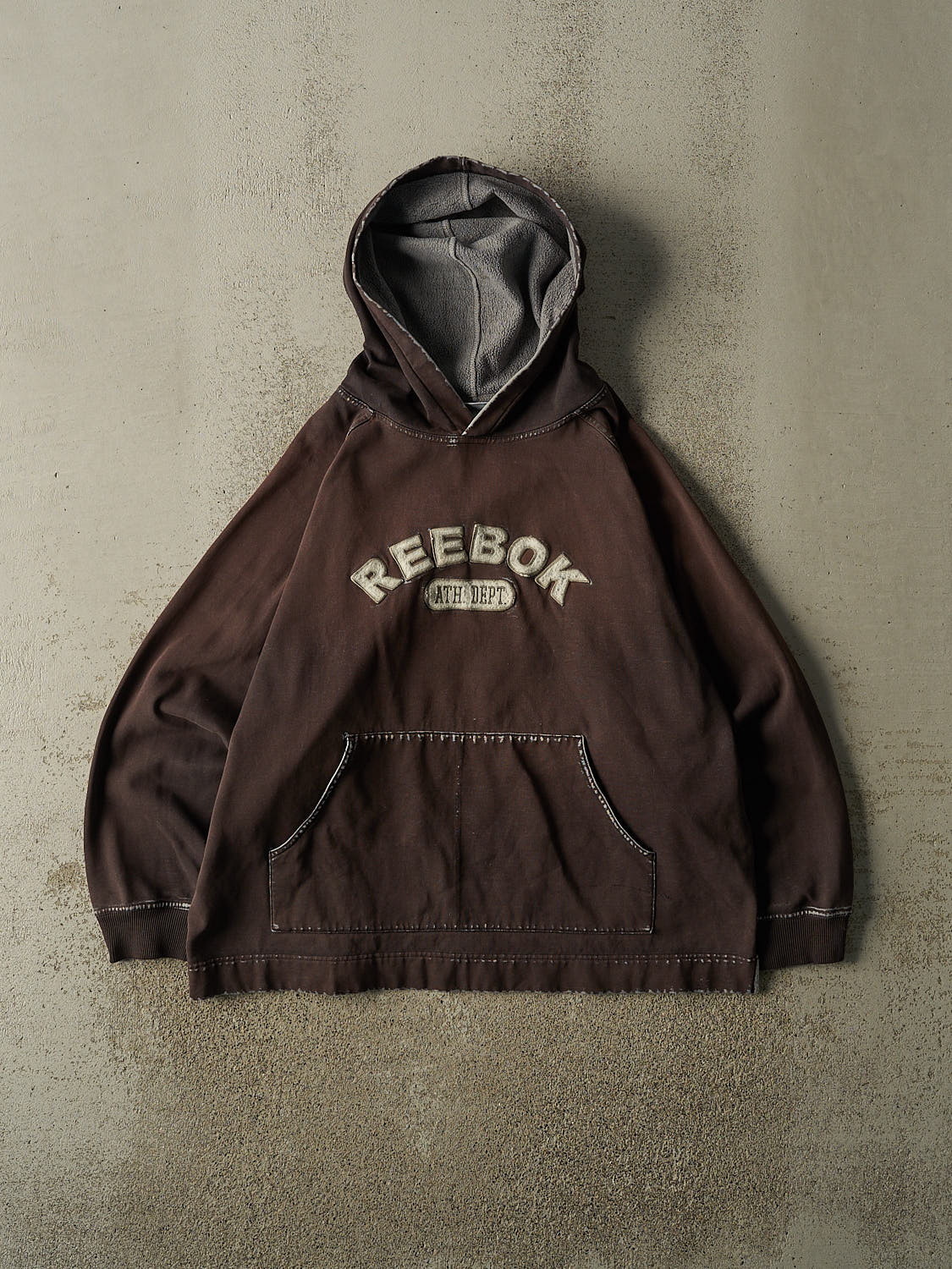 Vintage 90s Sun Faded Black Reebok Embroidered Hoodie (L/XL)