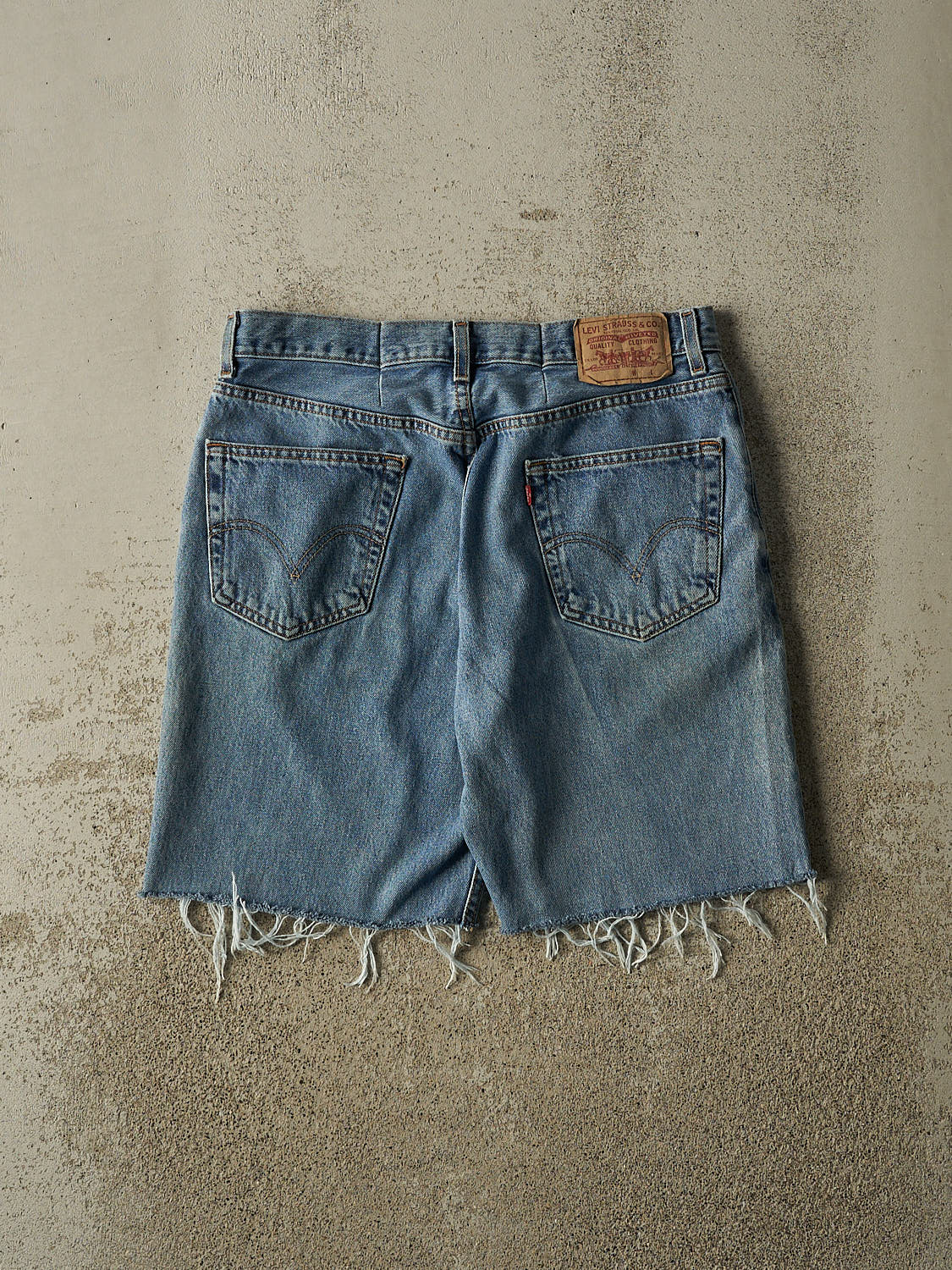 Vintage 90s Mid Wash Levi's 550 Cut Off Jean Shorts (34x9)