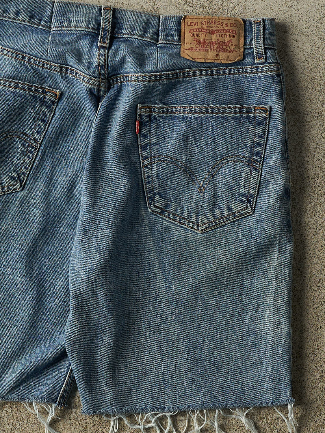 Vintage 90s Mid Wash Levi's 550 Cut Off Jean Shorts (34x9)