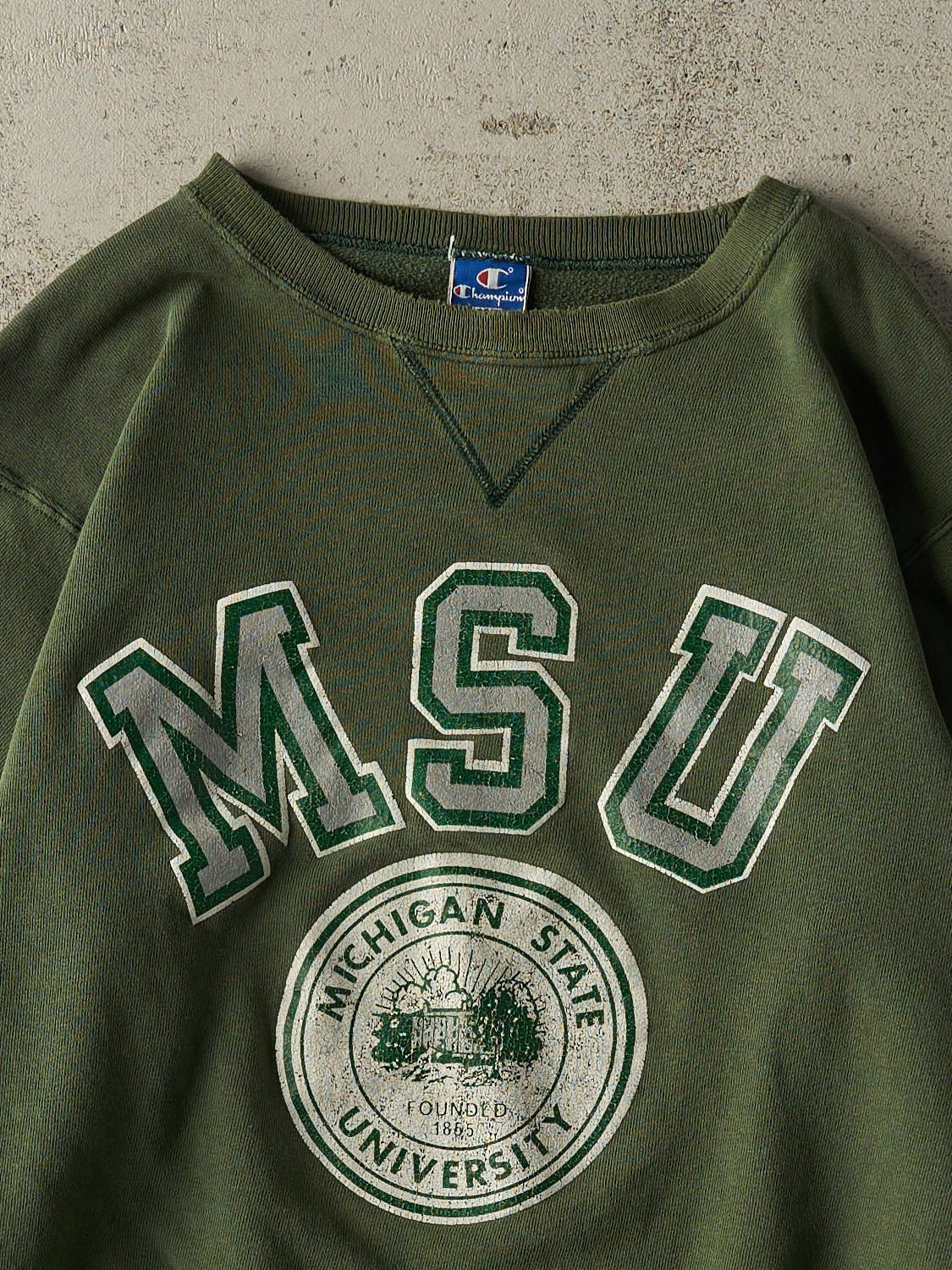 Vintage 90s Sun Faded Green Champion Michigan State University Crewneck (XS/S)
