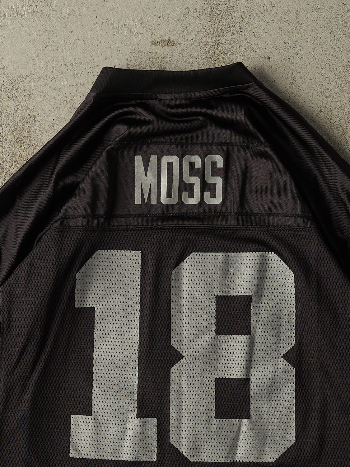 Vintage Y2K Black Oakland Raiders #18 Randy Moss Jersey (S/M)