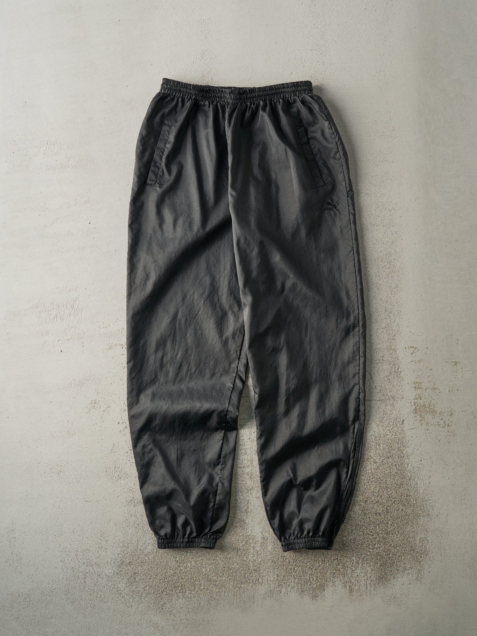 Vintage 90s Black Puma Tonal Logo Windbreaker Pants (30x31)