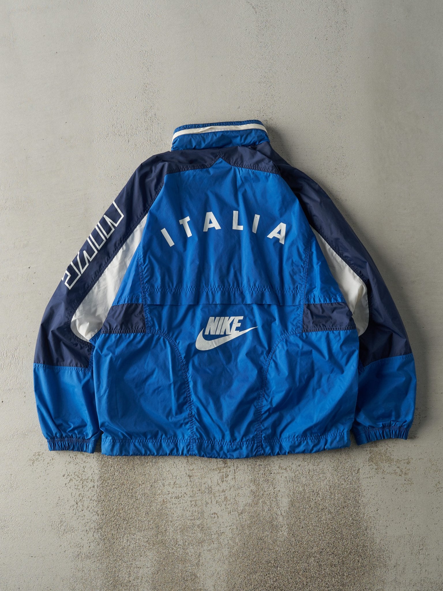 blue black and white nike jacket