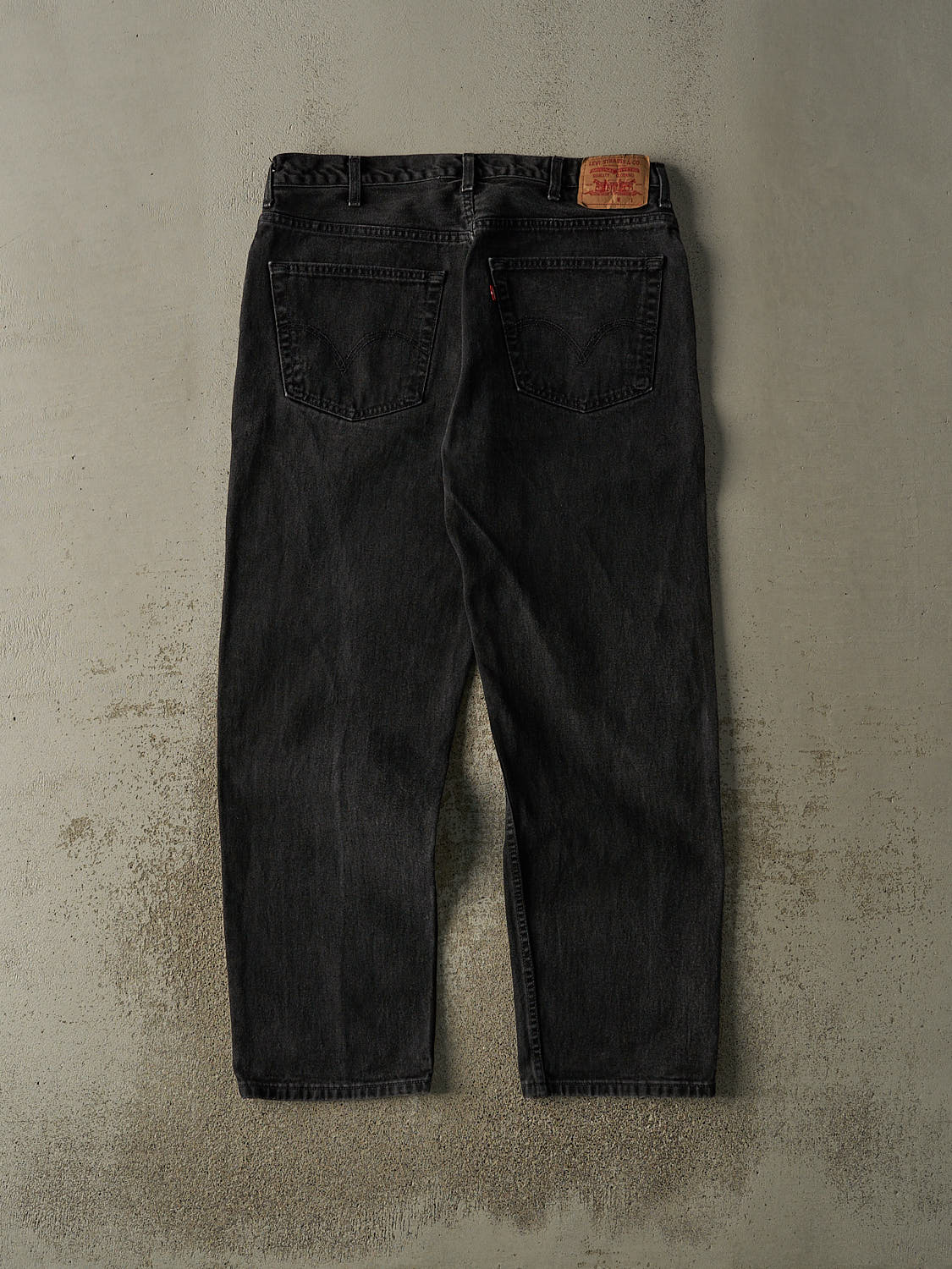 Vintage 90s Faded Black Levi's 550 Relaxed Fit Tapered Leg Denim Pants (36x31)