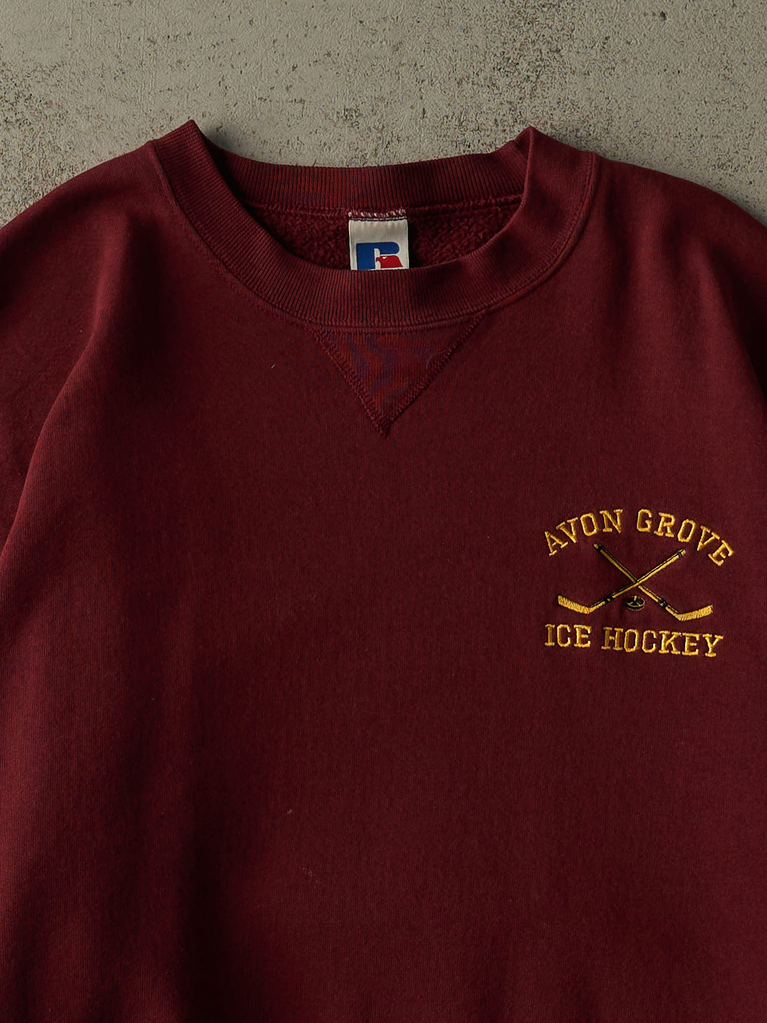 Vintage 90s Burgundy Avon Grove Ice Hockey Embroidered Russell Athletic Crewneck (L/XL)