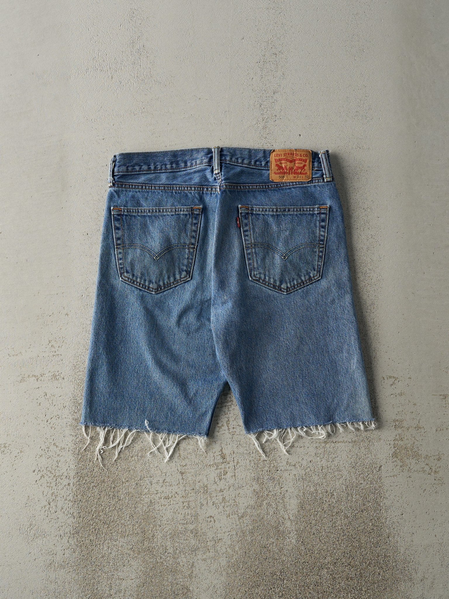 Vintage Y2K Mid Wash Levi's 505 Cut Off Jean Shorts (34x9.5)