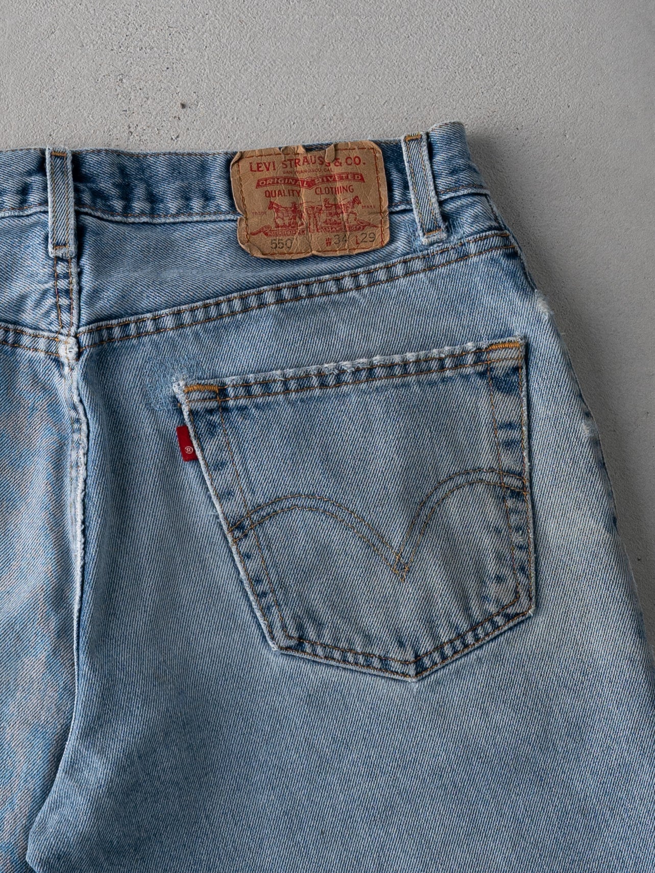 Vintage 90s Blue Levi 550 Distressed Denim Cut Off Shorts (33 x 6)