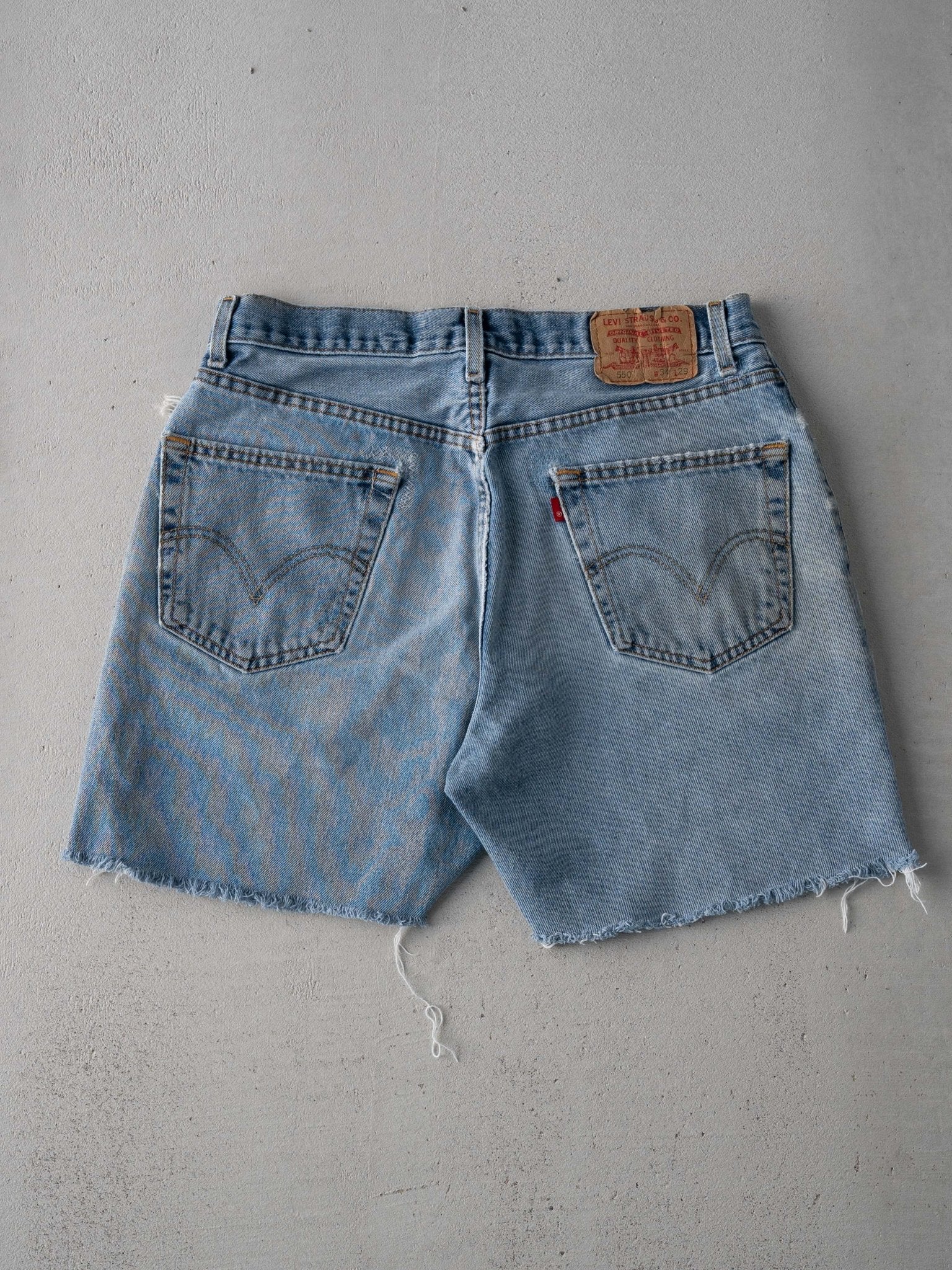 Vintage 90s Blue Levi 550 Distressed Denim Cut Off Shorts (33 x 6)