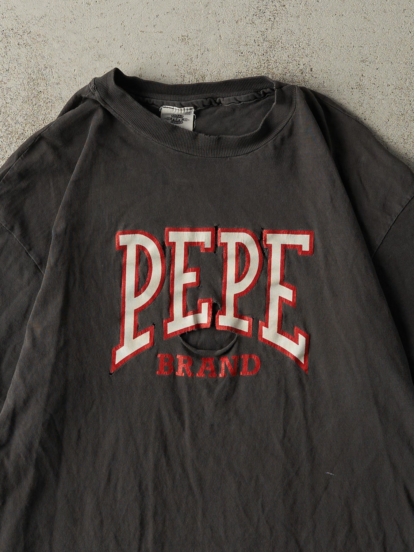 Vintage 90s Faded Black Pepe Single Stitch Tee (L/XL)